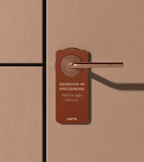 Visualization — a ‘Session in progress’ door hanger on a treatment-room door